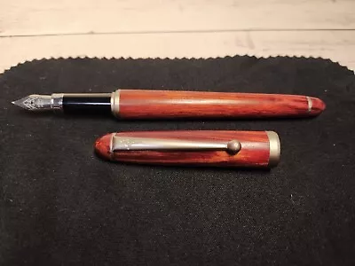 https://www.dealsanimg.com/img/ryUAAOSwHYxlUK9Q/wooden-fountain-pen-with-archer-logo-new-looking-condition.webp